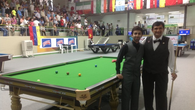 The United States' Ajeya Prabhakar (pictured right) with India's Pankaj Advani prior to their World Games Snooker match - Photo  SnookerUSA.com