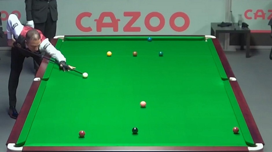 Ahmed Aly Elsayed pictured at the table during his 2023 British Open first round tie against Englishman Gary Wilson